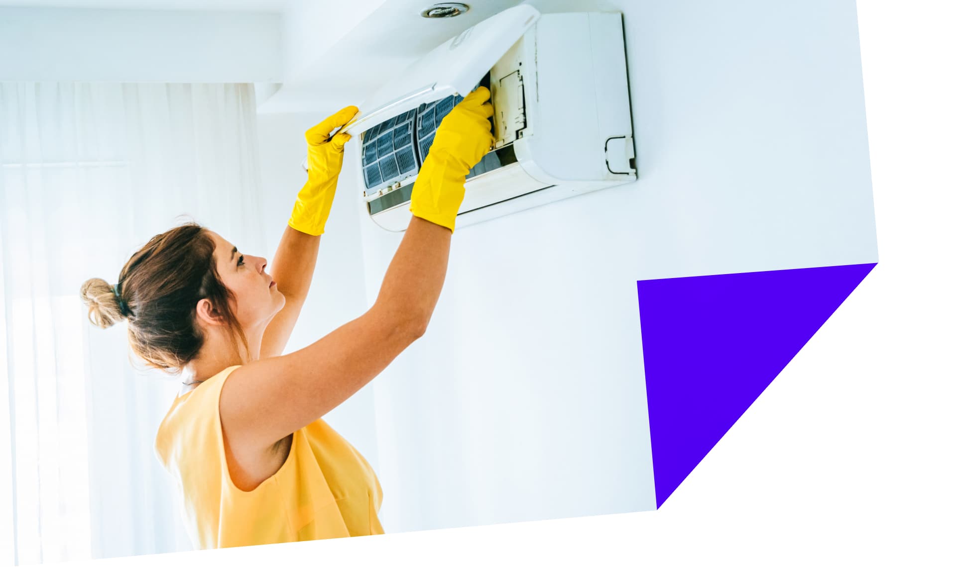 woman cleaning AC vent stock image